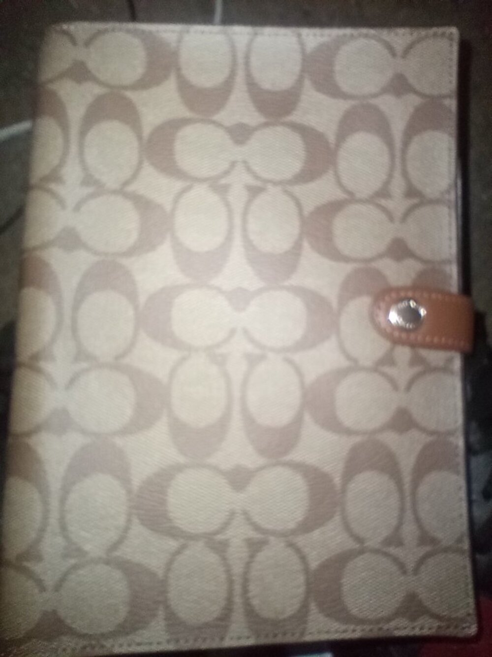 Coach notebook with paper